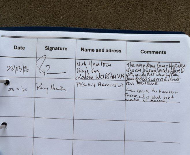 A page of the cemetery visitors' book with handwritten entries